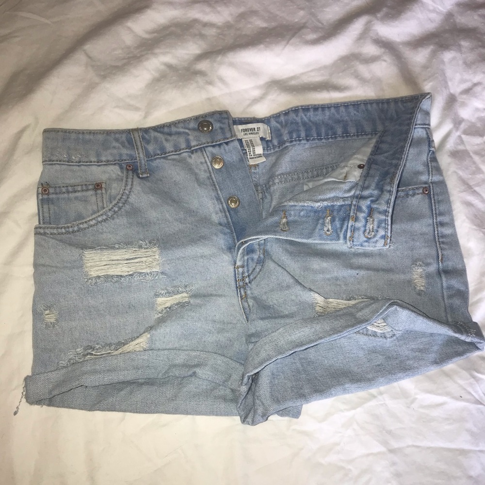 High waisted, light wash denim shorts.